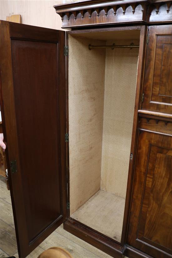 A Victorian mahogany inverted breakfront wardrobe W.218cm